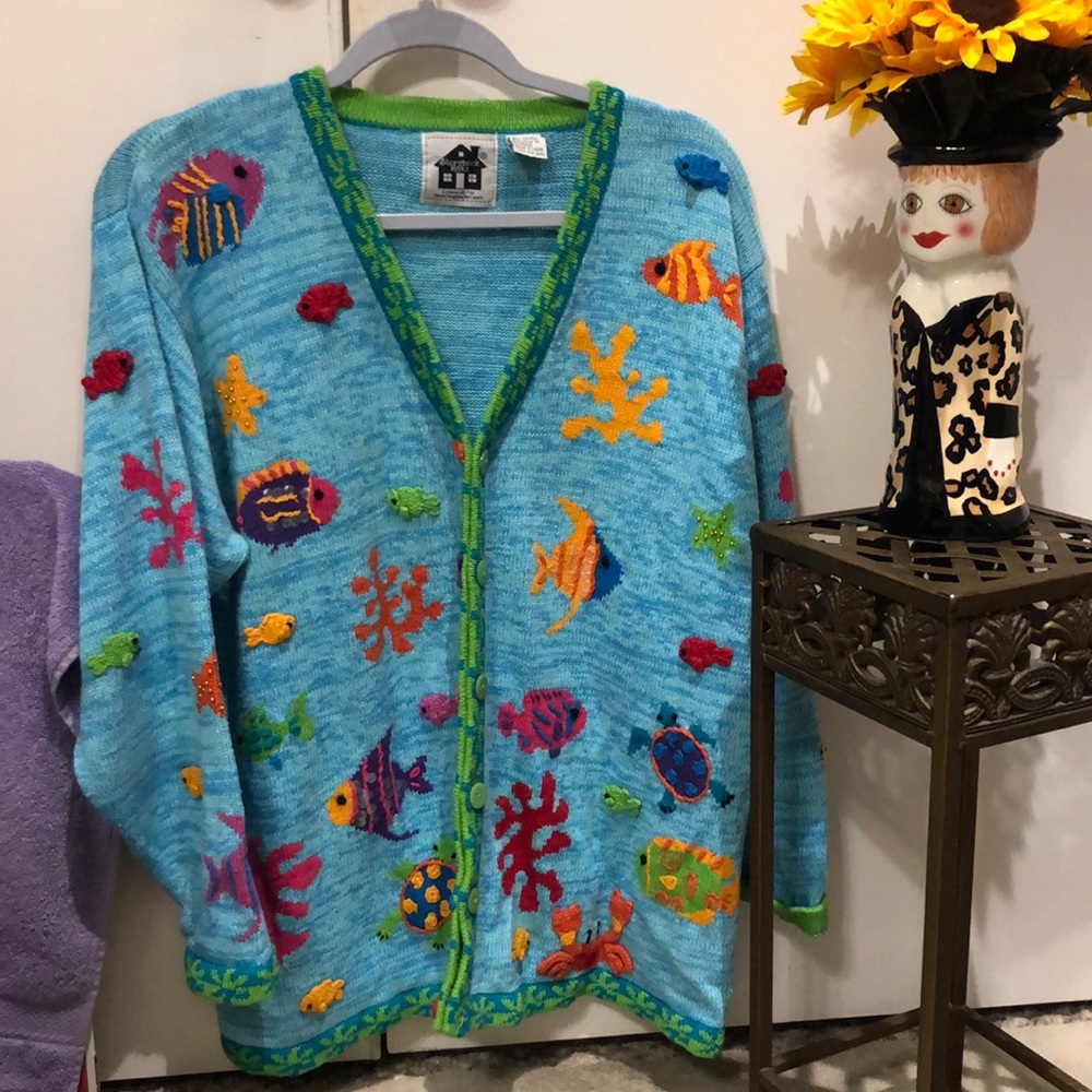 Beautiful under the sea inspired sweater with lots of fish crab turtle etc